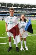 11 August 2018; Croke Park Community flagbearers Oscar Mullen and Amy Henry during the GAA Football All-Ireland Senior Championship semi-final match between Dublin and Galway at Croke Park in Dublin. Photo by Stephen McCarthy/Sportsfile