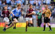 11 August 2018; Cahal McKaigue, St. Patricks PS Glen, Maghera, Derry, representing Galway, in action against Conor Yelland, St. Anthony’s BNS, Ballinlough, Cork, representing Dublin, during the INTO Cumann na mBunscol GAA Respect Exhibition Go Games at the GAA Football All-Ireland Senior Championship Semi Final match between Dublin and Galway at Croke Park in Dublin.  Photo by Brendan Moran/Sportsfile