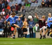 11 August 2018; Mattie McDermott, St Paul’s PS, Irvinestown, Fermanagh, representing Dublin, in action against Jeffrey Oates, St. Michael’s & St. Patrick’s NS, Boyle, Roscommon, representing Galway, during the INTO Cumann na mBunscol GAA Respect Exhibition Go Games at the GAA Football All-Ireland Senior Championship Semi Final match between Dublin and Galway at Croke Park in Dublin. Photo by Ray McManus/Sportsfile
