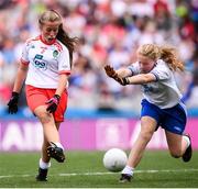 12 August 2018; Grace Morris, St Brigid's NS, Duagh NS, Listowel, Co Kerry, representing Tyrone, and Ciara O'Neill, The Rock NS, Portlaoise, Co Laois, representing Monaghan, during the INTO Cumann na mBunscol GAA Respect Exhibition Go Games at the GAA Football All-Ireland Senior Championship Semi Final match between Monaghan and Tyrone at Croke Park in Dublin.  Photo by Stephen McCarthy/Sportsfile