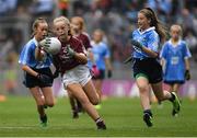 11 August 2018; Emer McEntee, Gowna NS, Gowna, Cavan, representing Galway, in action against Lea Carey, St. Mary’s NS, Sandyford, Dublin, left, and Ruby O’Connell Bell, Our Lady of Good Counsel GNS, Dublin, during the INTO Cumann na mBunscol GAA Respect Exhibition Go Games at the GAA Football All-Ireland Senior Championship Semi Final match between Dublin and Galway at Croke Park in Dublin.  Photo by Piaras Ó Mídheach/Sportsfile