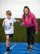 15 August 2018; Ireland’s World Championships Relay Heroes Ciara Neville, Gina Akpe Moses and Patience Jumbo Gula at the launch Aldi Community Games’ National Festival. Pictured at the launch is Ciara Neville with Elliot O'Connoll, age 7, from Raheen Co. Limerick at the new state of the art athletics track in UL, Limerick. Photo by Eóin Noonan/Sportsfile