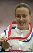 31 August 2003; Hayley Tullett of the Great Britain with the Bronze medal she won in the Women's 1500m Final during the ninth day's competition at the 9th IAAF World Championships in Athletics at the Stade de France in Paris, France. Photo by Brendan Moran/Sportsfile