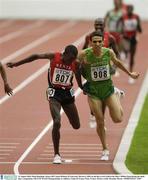 31 August 2003; Eliud Kipchoge of Kenya, left, beats Hicham El Guerrouj of Morocco on the line to win Gold in the Men's 5000m Final during the ninth day's competition at the 9th IAAF World Championships in Athletics at the Stade de France in Paris, France. Photo by Brendan Moran/Sportsfile