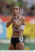 31 August 2003; Hayley Tullett of the Great Britain reacts after winning the Bronze medal in the Women's 1500m FInal during the ninth day's competition at the 9th IAAF World Championships in Athletics at the Stade de France in Paris, France. Photo by Brendan Moran/Sportsfile
