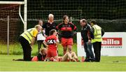 26 August 2018; Michelle McMahon of Louth, right, being attended to for an injury near the end of the game, which an Ambulance had to be called for, during the TG4 All-Ireland Junior Championship Semi Final match between Derry and Louth at Aghaloo O'Neills in Aughnacloy, Co. Tyrone. Photo by Oliver McVeigh/Sportsfile