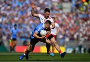 2 September 2018; Con O'Callaghan of Dublin is tackled by Mattie Donnelly of Tyrone during the GAA Football All-Ireland Senior Championship Final match between Dublin and Tyrone at Croke Park in Dublin. Photo by Brendan Moran/Sportsfile