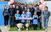 25 September 2018; Dublin Footballer Paul Mannion and Ladies footballer Lyndsey Davey were at AIG Insurance’s head office in Dublin today to mark their All-Ireland wins. AIG’s chosen charity for 2018, Aoibheann’s Pink Tie, also joined in the celebrations and were presented with a signed Dublin GAA jersey. In attendance at the AIG Cups visit are, Dublin footballers, backrow from left, Emma McDonagh, Davy Byrne, Eoin Murchan, Brian Howard, Con O'Callaghan, Cian O'Sullivan and Niamh Collins, with, front row, from left, Abbie Colfer, age 9, Kerri Behan, age 10, Senan O'Connor, age 13, Dylan Kavanagh, age 10 and Mark Lee, age 6,  at AIG Offices in Dublin. Photo by Sam Barnes/Sportsfile