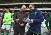 25 September 2018; Republic of Ireland & Celtic Legends manager Martin O'Neill and John Hartson discuss penalty takers during the Liam Miller Memorial match between Manchester United Legends and Republic of Ireland & Celtic Legends at Páirc Uí Chaoimh in Cork. Photo by Stephen McCarthy/Sportsfile