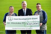 5 October 2018; FAI Chief Executive John Delaney presents a cheque to Rory McCarthy, left, Vice Chairman of St Mochta's FC, and Graham Brennan, Club Secretary of St Mochta's FC, during a ground development visit to St Mochta's FC in Dublin. Photo by Matt Browne/Sportsfile