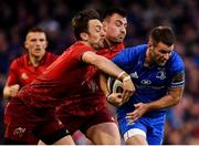 6 October 2018; Fergus McFadden of Leinster is tackled by Darren Sweetnam, left, and Niall Scannell of Munster during the Guinness PRO14 Round 6 match between Leinster and Munster at the Aviva Stadium in Dublin. Photo by Seb Daly/Sportsfile