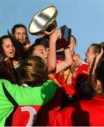 14 October 2018; Mia Dodd of Shelbourne lifts the trophy following the Continental Tyres Women's Under 17 National League Final match between Galway Women's and Shelbourne Ladies at Drom, Galway. Photo by Harry Murphy/Sportsfile