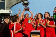 14 October 2018; Mia Dodd of Shelbourne lifts the trophy following the Continental Tyres Women's Under 17 National League Final match between Galway Women's and Shelbourne Ladies at Drom, Galway. Photo by Harry Murphy/Sportsfile