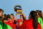 14 October 2018; Mia Dodd of Shelbourne lifts the trophy following the Continental Tyres Women's Under 17 National League Final match between Galway Women's and Shelbourne Ladies at Drom, Galway. Photo by Harry Murphy/Sportsfile