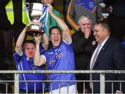 21 October 2018; Coalisland captain Stephen McNally and Shane Corr lift the cup after winning the Tyrone County Senior Club Football Championship Final match between Coalisland Fianna and Killyclogher St Mary's at Healy Park, Omagh, in Tyrone. Photo by Philip Fitzpatrick/Sportsfile