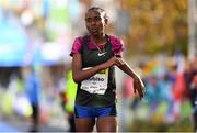 28 October 2018; Mesera Dubiso of Ethiopia crosses the line to become the first female finisher of the 2018 SSE Airtricity Dublin Marathon. 20,000 runners took to the Fitzwilliam Square start line to participate in the 39th running of the SSE Airtricity Dublin Marathon, making it the fifth largest marathon in Europe. Photo by Ramsey Cardy/Sportsfile