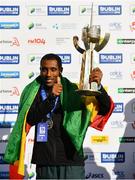 28 October 2018; Asefa Bekele of Ethiopia with the Noel Carroll Trophy after winning the 2018 SSE Airtricity Dublin Marathon. 20,000 runners took to the Fitzwilliam Square start line to participate in the 39th running of the SSE Airtricity Dublin Marathon, making it the fifth largest marathon in Europe. Photo by Ramsey Cardy/Sportsfile