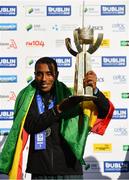 28 October 2018; Asefa Bekele of Ethiopia with the Noel Carroll Trophy after winning the 2018 SSE Airtricity Dublin Marathon. 20,000 runners took to the Fitzwilliam Square start line to participate in the 39th running of the SSE Airtricity Dublin Marathon, making it the fifth largest marathon in Europe. Photo by Ramsey Cardy/Sportsfile