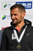 28 October 2018; On the podium following the 2018 SSE Airtricity Dublin Marathon is second placed finisher in the Athletics Ireland National Championships Sergiu Ciobanu of Clonliffe Harriers A.C., Dublin,20,000 runners took to the Fitzwilliam Square start line to participate in the 39th running of the SSE Airtricity Dublin Marathon, making it the fifth largest marathon in Europe. Photo by Ramsey Cardy/Sportsfile