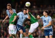 15 November 2018; Darragh Lenihan of the Republic of Ireland in action against Jonny Evans and Gareth McAuley and Craig Cathcart of Northern Ireland during the International Friendly match between Republic of Ireland and Northern Ireland at the Aviva Stadium in Dublin. Photo by Seb Daly/Sportsfile