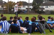17 November 2018; Dublin All-Ireland winner and All-Star Paul Mannion puts the Ballyboden under 13 boys’ football team through their paces. The team were selected as winners of the John West competition as part of their sponsorship of the Feile. John West has sponsored the Feile since 2016 and throughout the sponsorship, John West has focused on encouraging children to participate in Gaelic Games while emphasising the importance natural protein plays in fuelling a young athlete. Pictured is Paul Mannion speaking with young players during the John West Training Session with Paul Mannion at Ballyboden St Endas GAA in Ballyboden, Dublin. Photo by Eóin Noonan/Sportsfile