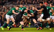 17 November 2018; Bundee Aki of Ireland is tackled by Ryan Crotty, left, and Beauden Barrett of New Zealand during the Guinness Series International match between Ireland and New Zealand at the Aviva Stadium in Dublin. Photo by Ramsey Cardy/Sportsfile