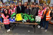 12 December 2018; FAI CEO John Delaney along with Republic of Ireland Women’s National Team manager Colin Bell were on hand today to hand over Ireland bags filled with jerseys, footballs, scarfs & other merchandise to Liam Casey, East Region President, St Vincent De Paul, at the St Vincent De Paul depot on Sean McDermott Street, Dublin. The gifts are part of an annual Christmas donation for families in need. Pictured are FAI CEO John Delaney, Republic of Ireland Women’s National Team manager Colin Bell, and Liam Casey, East Region President, St Vincent De Paul, with volunteers and helpers, at the St Vincent De Paul depot on Sean McDermott Street, Dublin. Photo by Seb Daly/Sportsfile