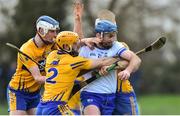 6 January 2019; Michael Walsh of Waterford in action against Diarmuid Ryan, Jason McCarthy and Aidan McCarthy of Clare during the Co-Op Superstores Munster Hurling League 2019 match between Waterford and Clare at Fraher Field in Waterford. Photo by Matt Browne/Sportsfile