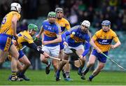 13 January 2019; Patrick Maher of Tipperary, supported by team-mate Noel McGrath, in action against Clare players, from left, Conor Cleary, David Conroy, Shane Golden, and Podge Collins during the Co-Op Superstores Munster Hurling League Final 2019 match between Clare and Tipperary at the Gaelic Grounds in Limerick. Photo by Piaras Ó Mídheach/Sportsfile