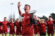 16 January 2019; Alex Hegarty of Catholic University School leads his side and supporters in celebrations after the Bank of Ireland Vinnie Murray Cup Round 2 match between Catholic University School and The High School at Energia Park in Dublin. Photo by Eóin Noonan/Sportsfile