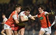 19 January 2019; Ciaran McLaughlin of Tyrone in action against Rian O'Neill, left, and Jarlath Og Burns of Armagh during the Bank of Ireland Dr McKenna Cup Final match between Armagh and Tyrone at the Athletic Grounds in Armagh. Photo by Oliver McVeigh/Sportsfile