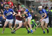 27 January 2019; Padraic Mannion of Galway in action against Aaron Dunphy, left, Paddy Purcell, centre, and Eanna Lyons of Laois during the Allianz Hurling League Division 1B Round 1 match between Galway and Laois at Pearse Stadium in Galway. Photo by Ray Ryan/Sportsfile
