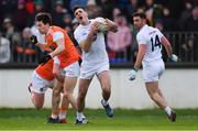 27 January 2019; Eoin Doyle of Kildare gets past Ryan McShane, behind, and James Morgan of Armagh as team-mate Ben McCormack looks on during the Allianz Football League Division 2 Round 1 match between Kildare and Armagh at St Conleth's Park in Newbridge, Kildare. Photo by Piaras Ó Mídheach/Sportsfile