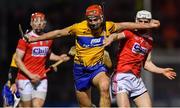 16 February 2019; Peter Duggan of Clare in action against David Griffin of Cork, as Bill Cooper, left, looks on during the Allianz Hurling League Division 1A Round 3 match between Cork and Clare at Páirc Uí Rinn in Cork. Photo by Piaras Ó Mídheach/Sportsfile