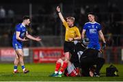 23 February 2019; Dessie Ward of Monaghan receives a black card from referee Ciaran Branagan for a tackle on Ronan McNamee of Tyrone during the Allianz Football League Division 1 Round 4 match between Tyrone and Monaghan at Healy Park in Omagh, Co Tyrone. Photo by Stephen McCarthy/Sportsfile