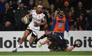 23 February 2019; Robert Baloucoune of Ulster goes over to score his side's eighth try despite the efforts of Daniele Rimpelli of Zebre during the Guinness PRO14 Round 16 match between Ulster and Zebre at the Kingspan Stadium in Belfast. Photo by Oliver McVeigh/Sportsfile