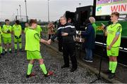 24 February 2019; Paddy Dempsey, DDSL Chairman, presents the winners medals to the DDSL players following the U15 SFAI SUBWAY Championship Final match between DDSL and Waterford SL at Mullingar Athletic FC in Gainestown, Mullingar, Co. Westmeath. Photo by Sam Barnes/Sportsfile