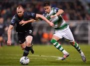 1 March 2019; Chris Shields of Dundalk in action against Ronan Finn of Shamrock Rovers during the SSE Airtricity League Premier Division match between Shamrock Rovers and Dundalk at Tallaght Stadium in Dublin. Photo by Seb Daly/Sportsfile