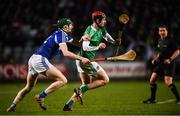 9 March 2019; David Dempsey of Limerick in action against Aaron Dunphy of Laois during the Allianz Hurling League Division 1 Quarter-Final match between Laois and Limerick at O'Moore Park in Portlaoise, Laois. Photo by Stephen McCarthy/Sportsfile