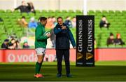 10 March 2019; Ireland head coach Joe Schmidt in conversation with Jordan Larmour prior to the Guinness Six Nations Rugby Championship match between Ireland and France at the Aviva Stadium in Dublin. Photo by Ramsey Cardy/Sportsfile