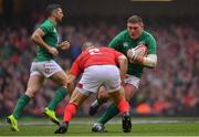 16 March 2019; Tadhg Furlong of Ireland is tackled by Ken Owens of Wales during the Guinness Six Nations Rugby Championship match between Wales and Ireland at the Principality Stadium in Cardiff, Wales. Photo by Ramsey Cardy/Sportsfile