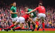 16 March 2019; Tadhg Furlong of Ireland is tackled by Ken Owens and Alun Wyn Jones of Wales during the Guinness Six Nations Rugby Championship match between Wales and Ireland at the Principality Stadium in Cardiff, Wales. Photo by Brendan Moran/Sportsfile