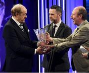 17 March 2019; Brendan Bradley receives the Special Merit award from Minister for Transport, Tourism and Sport, Shane Ross T.D. and Alan Peyton of Three during the Three FAI International Awards at RTE Studios in Donnybrook, Dublin. Photo by Stephen McCarthy/Sportsfile