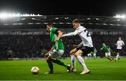 21 March 2019; Jordan Jones of Northern Ireland in action against Artjom Dmitrijev of Estonia during the UEFA EURO2020 Qualifier - Group C match between Northern Ireland and Estonia at National Football Stadium in Windsor Park, Belfast.  Photo by David Fitzgerald/Sportsfile