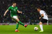 21 March 2019; Paddy McNair of Northern Ireland in action against Gert Kams of Estonia during the UEFA EURO2020 Qualifier - Group C match between Northern Ireland and Estonia at National Football Stadium in Windsor Park, Belfast.  Photo by David Fitzgerald/Sportsfile