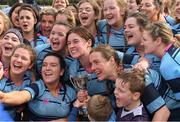 23 March 2019; MU Barnhall RFC captain Elaine Rayfus after her team-mates celebrate with the cup after the Bank of Ireland Leinster Rugby Women’s Division 3 Cup Final match between Dublin University and MU Barnhall RFC at Naas RFC in Naas, Kildare. Photo by Piaras Ó Mídheach/Sportsfile