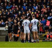 24 March 2019; Referee Rory Hickey issues yellow cards to James McCarthy and Niall Scully of Dublin and to Conor Rehill and Killian Clarke of Cavan during the Allianz Football League Division 1 Round 7 match between Cavan and Dublin at Kingspan Breffni in Cavan. Photo by Ray McManus/Sportsfile
