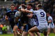 24 March 2019; Con O’Callaghan of Dublin is tackled by Conor Moynagh and Killian Clarke, 9, of Cavan during the Allianz Football League Division 1 Round 7 match between Cavan and Dublin at Kingspan Breffni in Cavan. Photo by Ray McManus/Sportsfile