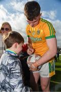 24 March 2019; Meath's Darragh Campion signing a ball for Bobby Mallon from Navan after the game with Daragh McCoy (7) and Riona McCoy (9) from Kentstown in the Allianz Football League Division 2 Round 7 match between Meath and Fermanagh at Páirc Tailteann in Navan, Co Meath. Photo by Philip Fitzpatrick/Sportsfile