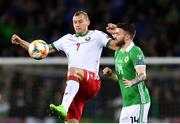 24 March 2019; Denis Laptev of Belarus in action against Stuart Dallas of Northern Ireland during the UEFA EURO2020 Qualifier Group C match between Northern Ireland and Belarus at the National Football Stadium in Windsor Park, Belfast. Photo by Ramsey Cardy/Sportsfile